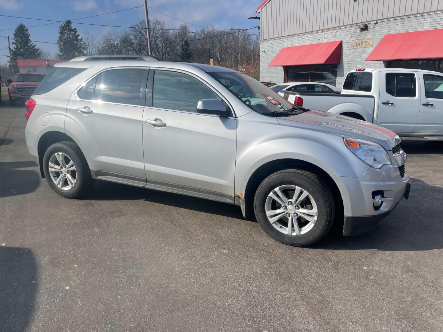 2013 Silver /Black Chevrolet Equinox 2LT 2WD (2GNALPEK5D6) with an 2.4L I4 DOHC 16V engine, 6-Speed Automatic transmission, located at 11115 Chardon Rd. , Chardon, OH, 44024, (440) 214-9705, 41.580246, -81.241943 - Photo#3